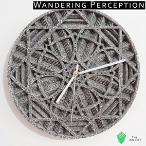 May include: A gray and white circular clock with a geometric design. The clock face features a silver flower pattern with a gold center. The clock hands are white and the text "WANDERING PERCEPTION" is at the top.
