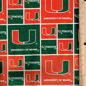 University of Miami,UMIAMI,45&quot;wide 100% cotton, Listed @ 1/2 yard sport