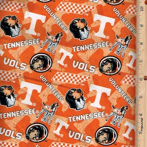 College ,Tenn. VOLS,45" wide 100% cotton,1/2 yards