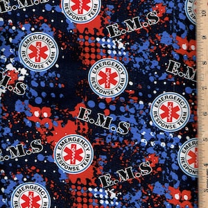 May include: A dark blue fabric with a repeating pattern of red and blue paint splatters. The fabric also features white circles with the text "Emergency Response Team" and a red medical symbol. The text "E.M.S." is repeated throughout the fabric.