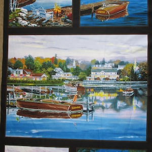 May include: A fabric panel featuring multiple scenic lake views. Each scene depicts wooden boats, docks, and lakeside homes. The artwork includes details like a full moon, a bonfire, and reflections in the water, creating a serene atmosphere.