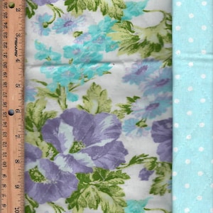 Pre quilted,  double faced, Listed @1/2 yard, light blue dot on back