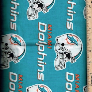 Sports, Dolphins, 58&quot; wide 100% cotton, Listed @ 1/2 yard
