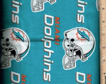 Sports, Dolphins, 58" wide 100% cotton, Listed @ 1/2 yard