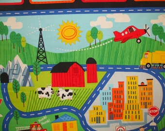 May include: A colorful playmat with a road, a farm, a city, and a plane flying overhead. The playmat features a red barn, a yellow school bus, a red airplane, and a blue road with white dashed lines. The playmat is perfect for imaginative play and learning.
