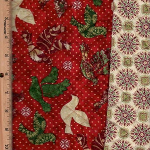 Pre Quilted,Christmas Birds w/ gold lining.(Sale) Listed @1/2 yard