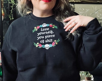 Love yourself you piece of shit  embroidered unisex crewneck sweater