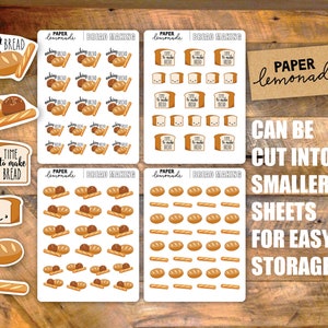 May include: A collection of bread-themed stickers and labels. The stickers feature illustrations of various bread types, including loaves, baguettes, and toast. Some stickers have text like "making bread" and "time to make bread". The background is a wooden surface.