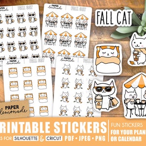 May include: Printable stickers featuring a fall cat theme. The stickers include a cat wearing sunglasses and holding a cup of coffee, a cat sleeping in a blanket, and a cat sitting at a table with a friend. The stickers are perfect for adding a touch of fall to your planner or calendar.
