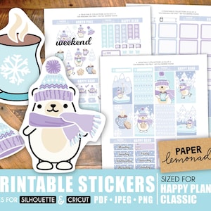 May include: Printable stickers designed for the Happy Planner Classic. The stickers feature a winter theme with a purple and blue colour scheme. The stickers include a bear wearing a purple scarf, a cup of hot chocolate, and a winter hat.