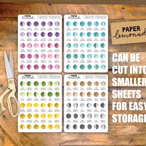 May include: Four sheets of stickers with different watercolor moon phases. Each sheet has 24 stickers with different phases of the moon, including new moon, waxing crescent, first quarter, waxing gibbous, full moon, waning gibbous, last quarter, and waning crescent. The text "PAPER LEMONADE" and "MOON PHASES" is printed on each sheet. The text "CAN BE CUT INTO SMALLER SHEETS FOR EASY STORAGE" is printed below the sheets.