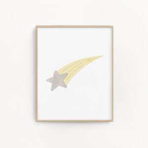 May include: A framed print of a yellow shooting star with a gray star at the end. The print is on a white background.