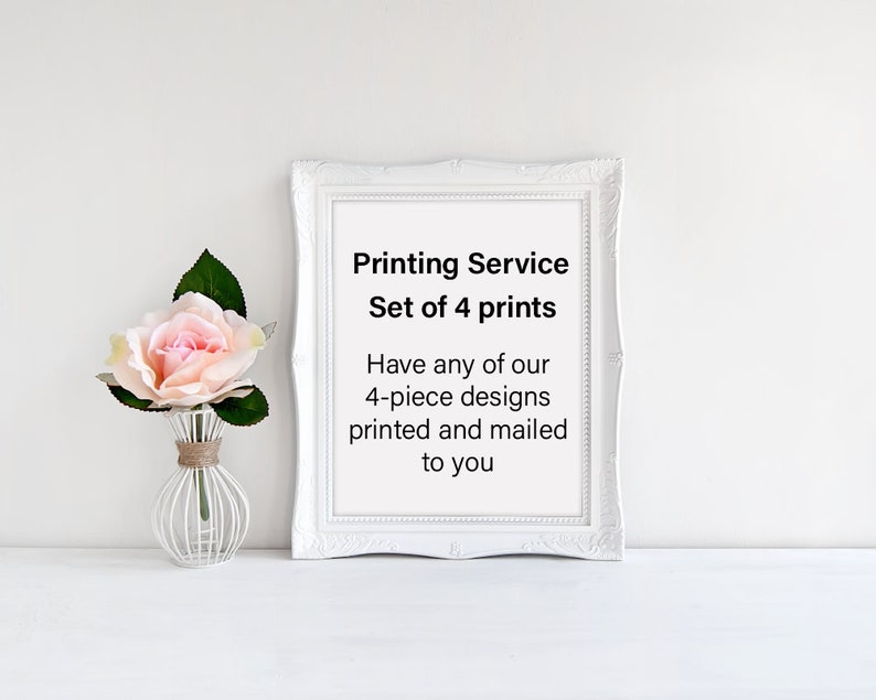 May include: White framed sign with the text "Printing Service Set of 4 prints Have any of our 4-piece designs printed and mailed to you". A pink rose in a white vase is in the foreground.
