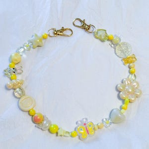 ハンドメイド イエローゴールド バニー バタフライ フラワー ビーズ バッグチェーン 財布チャーム 花 星 楽しいバッグアクセサリー カラフル マルチバッグチャーム 長さ19インチ