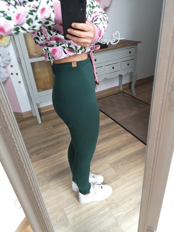 Green leggings in store outlet