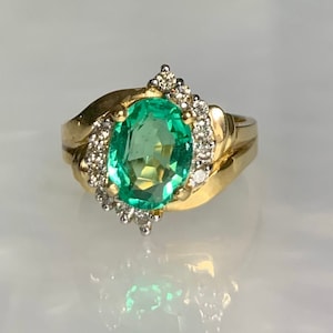 Vintage Colombian Emerald Ring: 14k Yellow Gold Diamond Halo