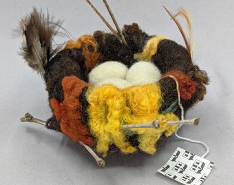 Felted Bird Nest in Warm colors with Cream Eggs and a Tea Bag