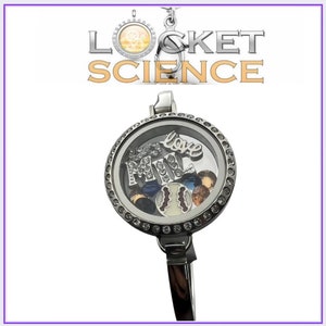 May include: A silver locket bracelet with a clear glass charm. The charm contains a baseball, a few small gems, and the words "Love My" with rhinestones.