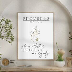 Può includere: Una stampa di arte da parete stampabile bianca con un disegno a linea nera e verde di un viso di donna. Il testo "Proverbi 3:25" e "Lei è vestita di forza e dignità" è stampato sulla stampa.