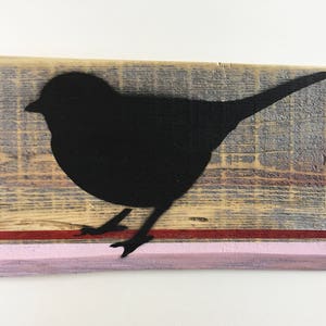 Black Bird with Pink Stripes on Old Wood Sign image 1