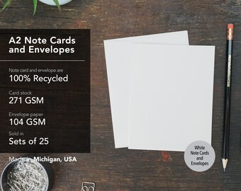May include: White A2 note cards and envelopes made from 100% recycled paper. The card stock is 271 GSM and the envelope paper is 104 GSM. Sold in sets of 25.