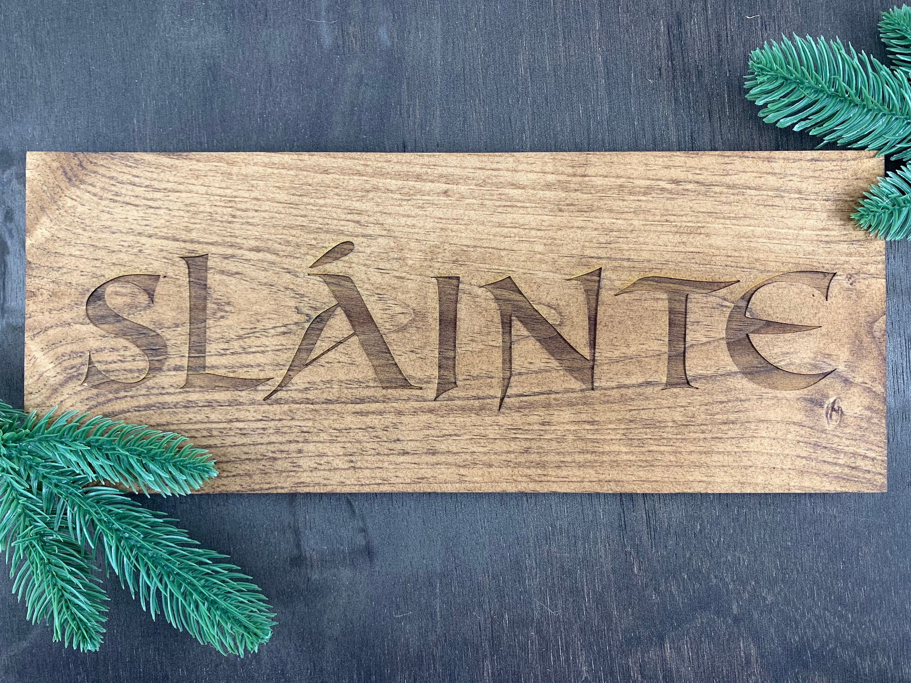 Slainte laser etched sign on weathered board
