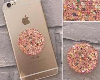 Sparkly pink and yellow resin expanding phone grip, mobile phone grip, resin phone grip, phone holder, mobile phone accessory.