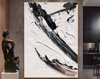 May include: Abstract painting with black and white brushstrokes on a white canvas. The painting has a modern and minimalist style.