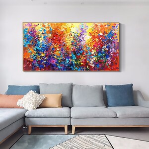 May include: Abstract painting with a colorful, textured, and vibrant design. The painting features a variety of colors, including red, orange, yellow, green, blue, purple, and pink. The painting is done in a thick, impasto style, giving it a three-dimensional appearance.