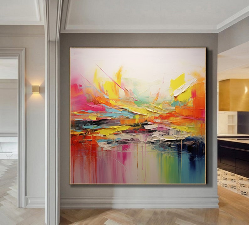 May include: Abstract painting with vibrant colors, including yellow, pink, blue, and green. The painting has a textured, layered look, with thick brushstrokes and a sense of movement.