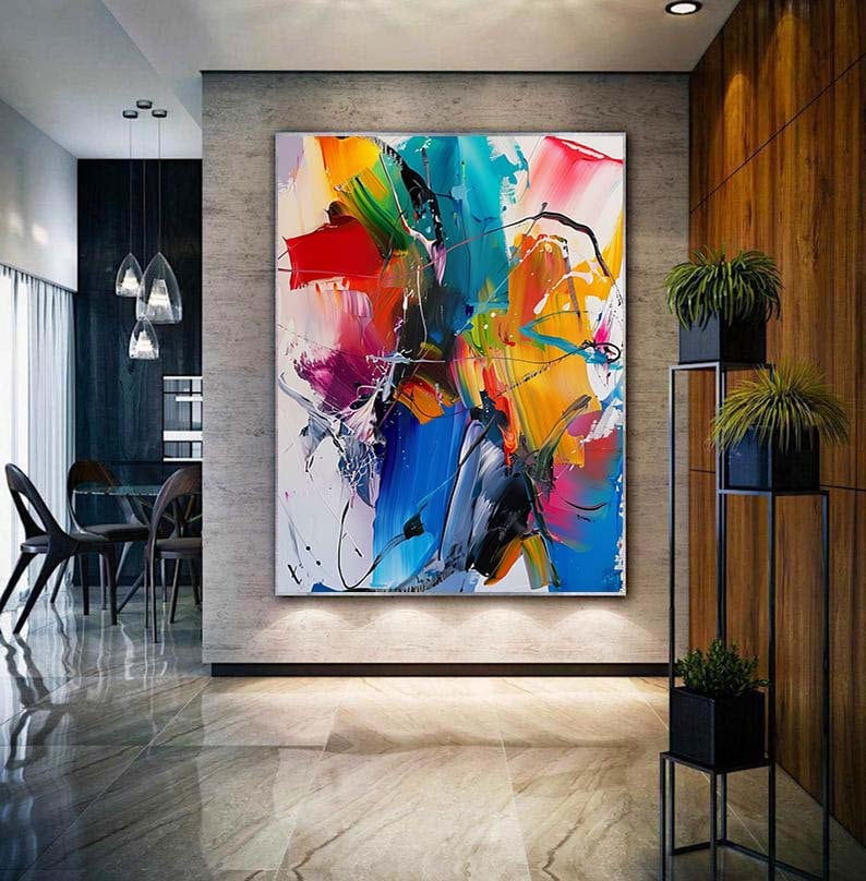Puede incluir: Pintura abstracta con colores vibrantes, incluyendo rojo, amarillo, azul, verde y rosa. La pintura presenta trazos audaces y una composici&oacute;n din&aacute;mica.