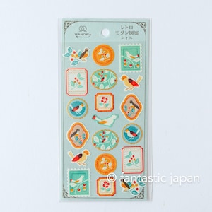 May include: A sheet of decorative stickers with vintage-style designs of birds, flowers, and berries. The stickers are in various shapes, including circles, ovals, and rectangles, set against a light blue background. The text "WANOWA" and Japanese text are visible.