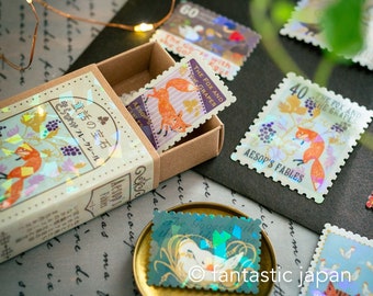 Postage flake stickers in a match box -Aesop's Fairy Tales 1 -