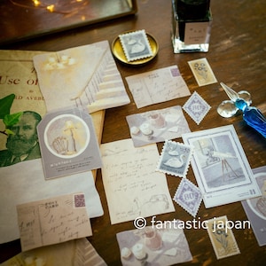 May include: A collection of vintage-style decorative stickers featuring illustrations of a lamp, a telescope, a swan, and a cup of tea. The stickers are printed on white paper with a light brown border and have a distressed, vintage look. The stickers are perfect for adding a touch of whimsy and charm to journals, planners, and other paper crafts.