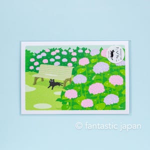 tabi-neko-briefkaart -beschutting tegen de regen-