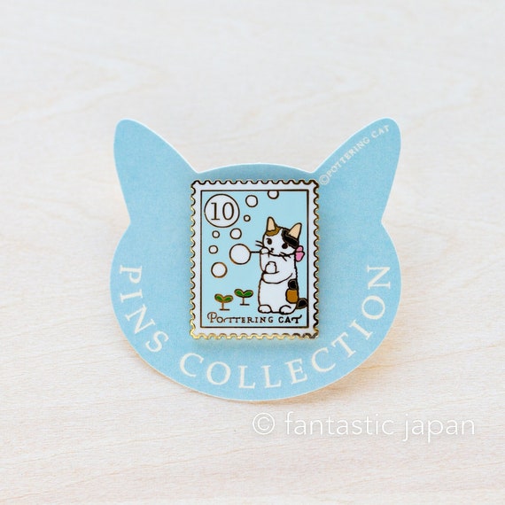 Cat Blowing Bubbles Stamp Enamel Pin Cat Blowing Bubbles Stamp Enamel Pin
