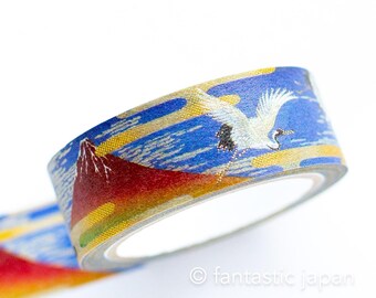 May include: Decorative washi tape featuring a Japanese landscape with Mount Fuji and a crane in flight. The tape has a blue, gold, and red color scheme, with the text "fantastic japan" in the bottom right corner.