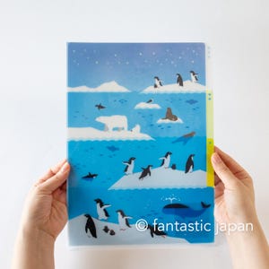 May include: A clear plastic file folder featuring an arctic scene with penguins, polar bears, and a whale. The background is a light blue sky with white ice floes. The text "fantastic japan" is in the lower right corner.