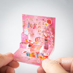 Pequeno cartão pop-up de Natal - mini mini Papais Noéis rosa quarto-