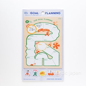 以下が含まれることがあります： ベージュの背景に緑とオレンジのイラストが描かれた、Goal Planningの付箋パッド。日付と「YOU CAN DO IT！」と「GOAL！」のテキスト用のスペースがあるゲームのようなデザインです。また、6つの装飾ステッカーも含まれています。