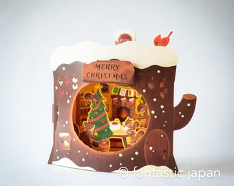 Melody and Light holiday card -Squirrel house on a stump-