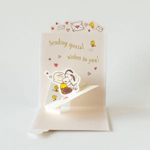 Hallmark / PEANUTS Pop-up-Minikarte -Charlie mit Buchstabe-