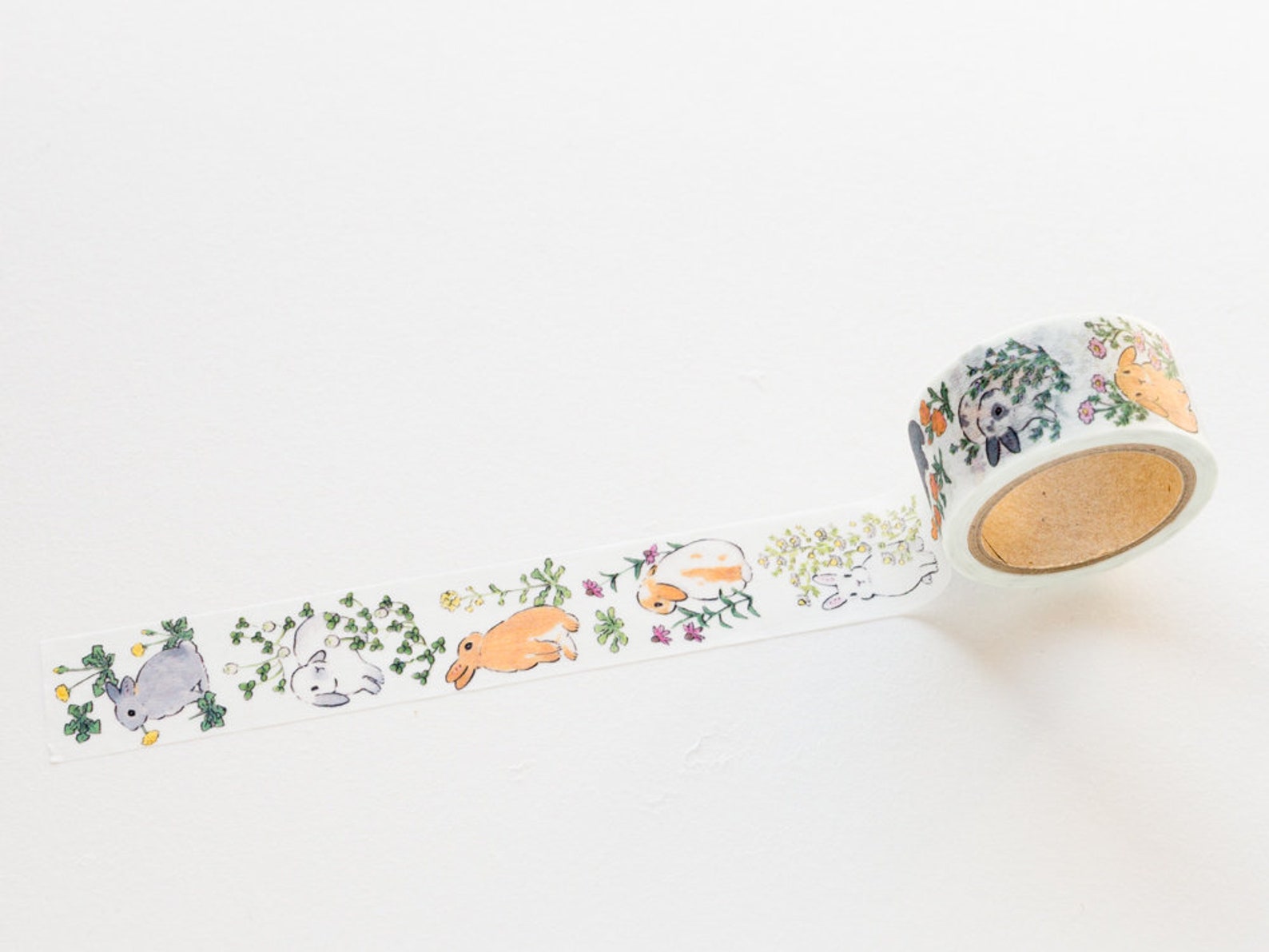 Masking Tape rabbits in the Flower by Schinako Moriyama / Etsy Canada
