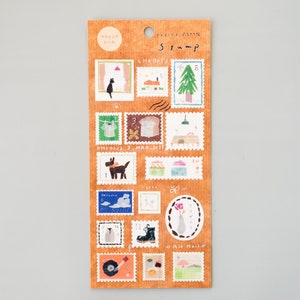 May include: A sheet of 16 illustrated stamps with various designs, including a cat, a house, a tree, a dog, a cloud, a boot, a record player, and a flower. The stamps are printed on a brown background with the text "Stamp" in black.