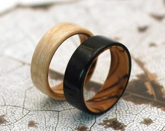 Silent Sanctity: Bethlehem Olive Wood Core Bentwood Ring
