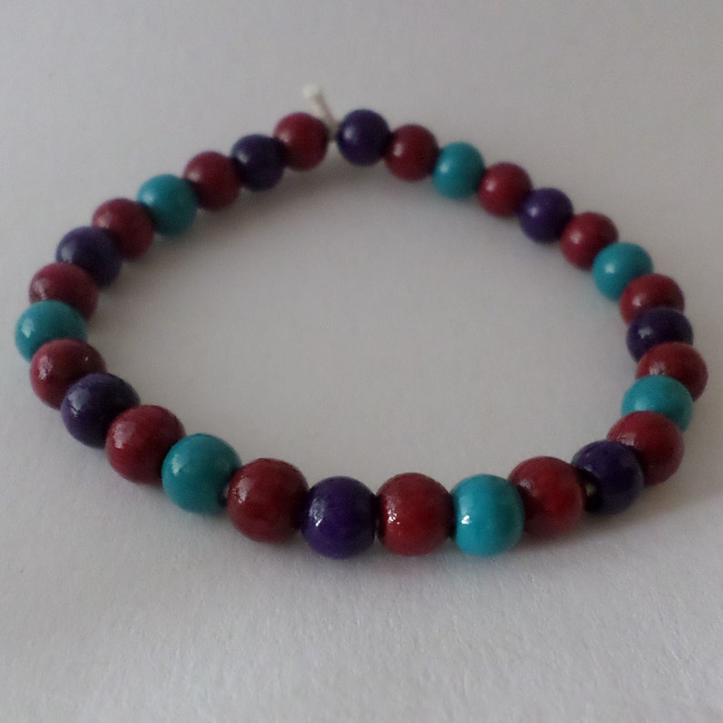 Wood beads Bracelet purple , red & green with eco elastic band image 1