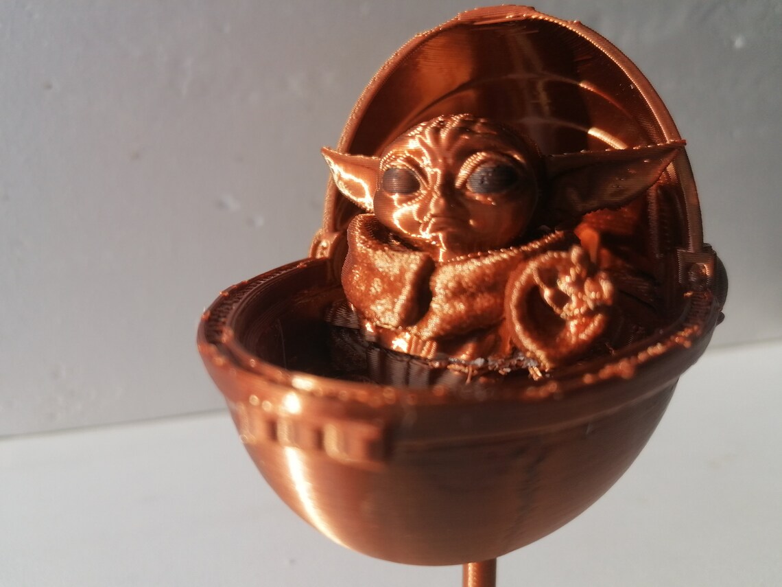 Baby Yoda Mandalorian in her cradle Etsy