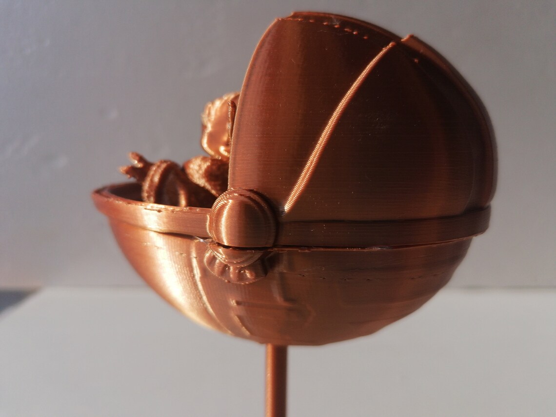 Baby Yoda Mandalorian in her cradle Etsy