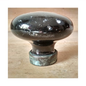 Large black ceramic door knob - old round black handle