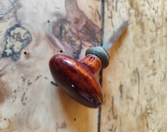 Pair of brown olive-shaped handles